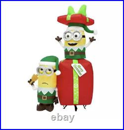 Gemmy Universal 5 ft Pre Lit LED Minion Elves with Present Airblown Inflatable